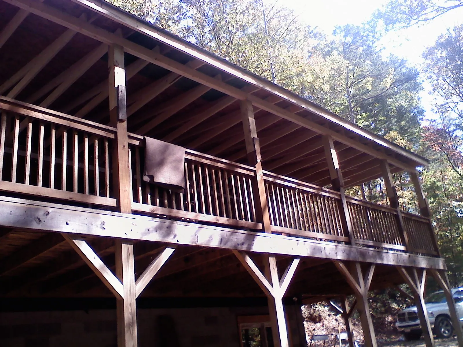 Timber framing under a new elevated porch and deck — Roof Leak Repair in Swartz Creek by Roofing Brothers